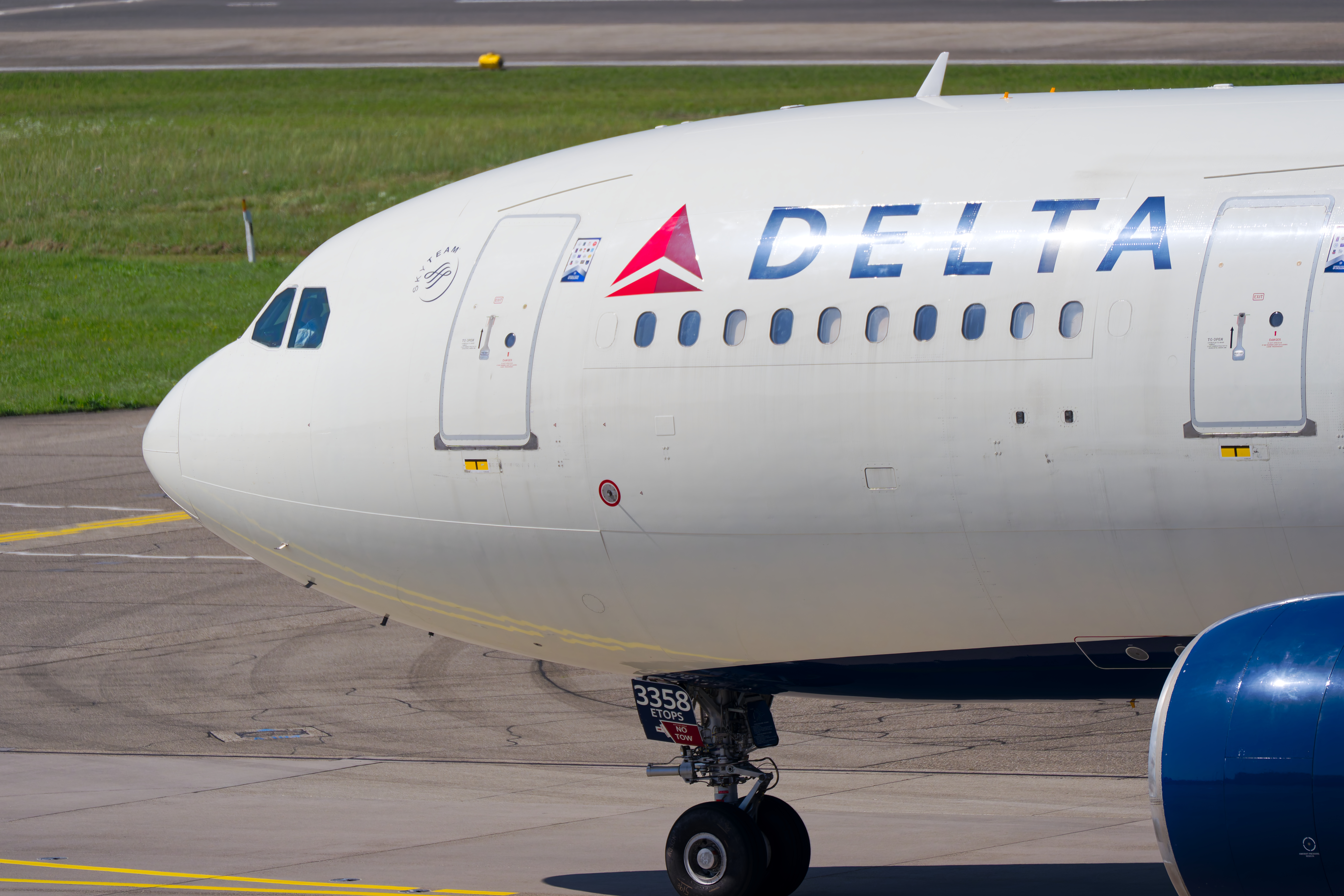Delta airplane at airport gate