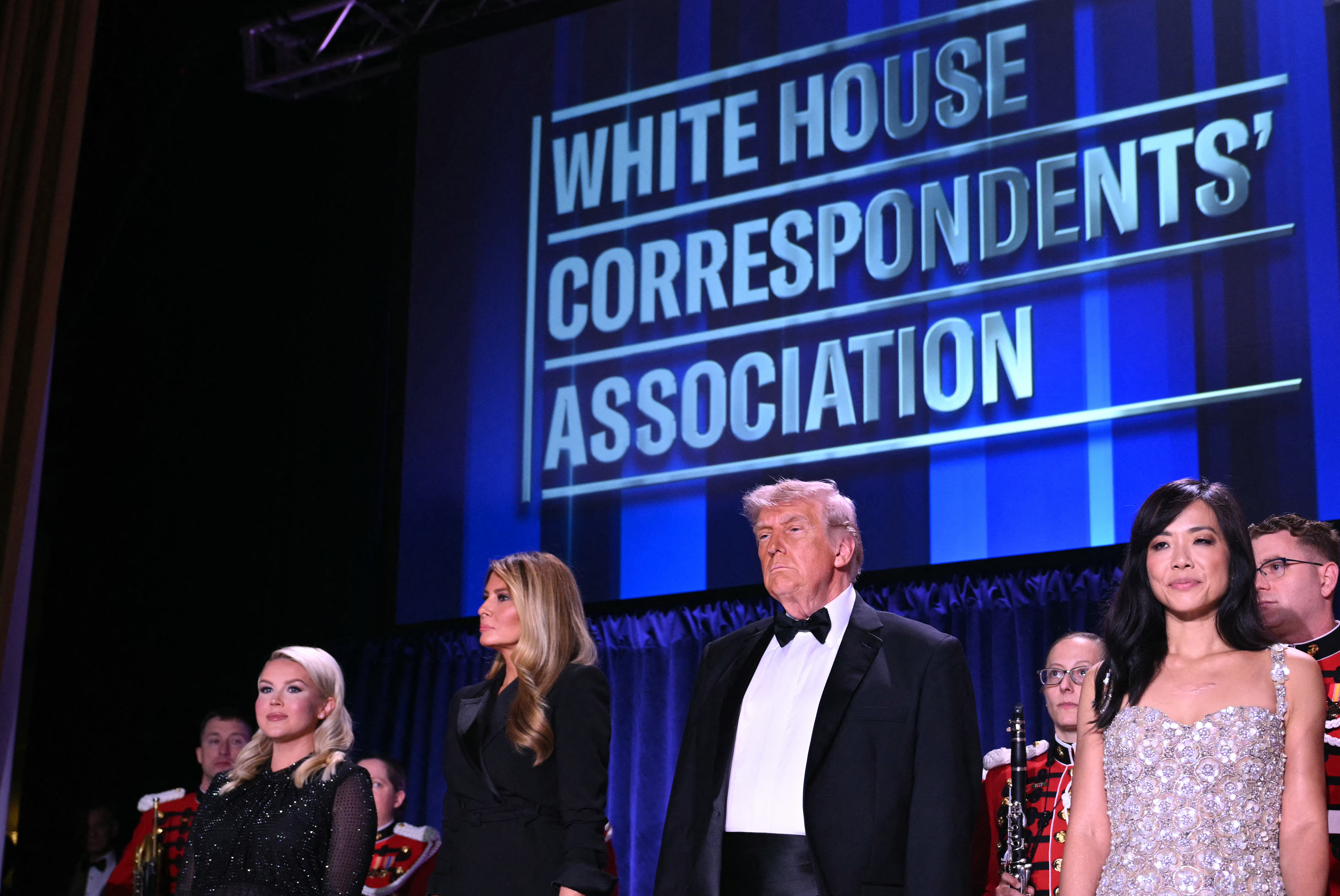 President safely evacuated from correspondents' dinner after armed man charged security