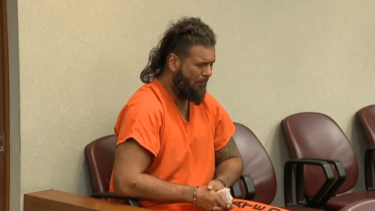Man accused of assaulting and filming burned girlfriend breaks down at hearing