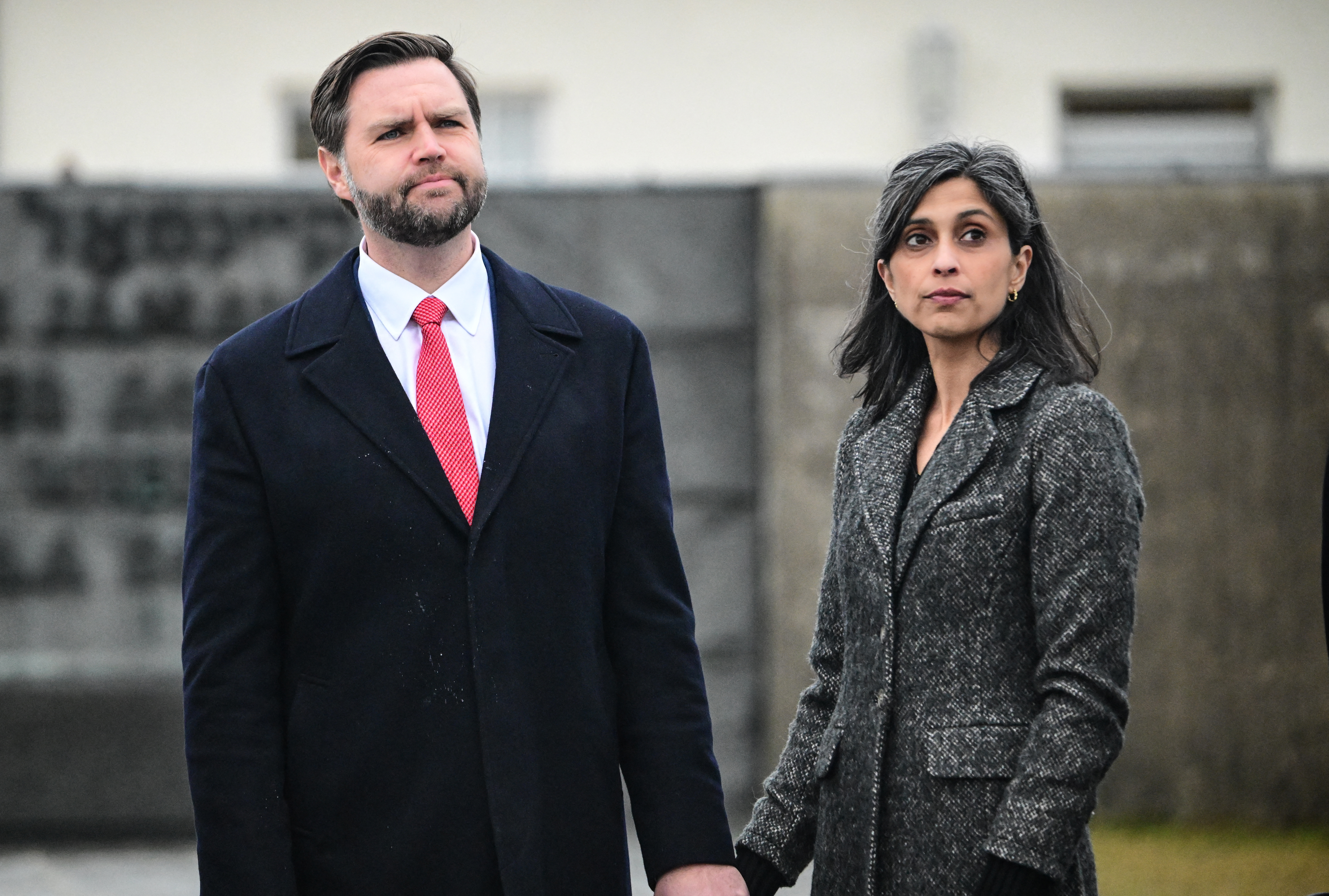 U.S. Vice President JD Vance (L) stands with his wife Usha Vance on February 13, 2025.