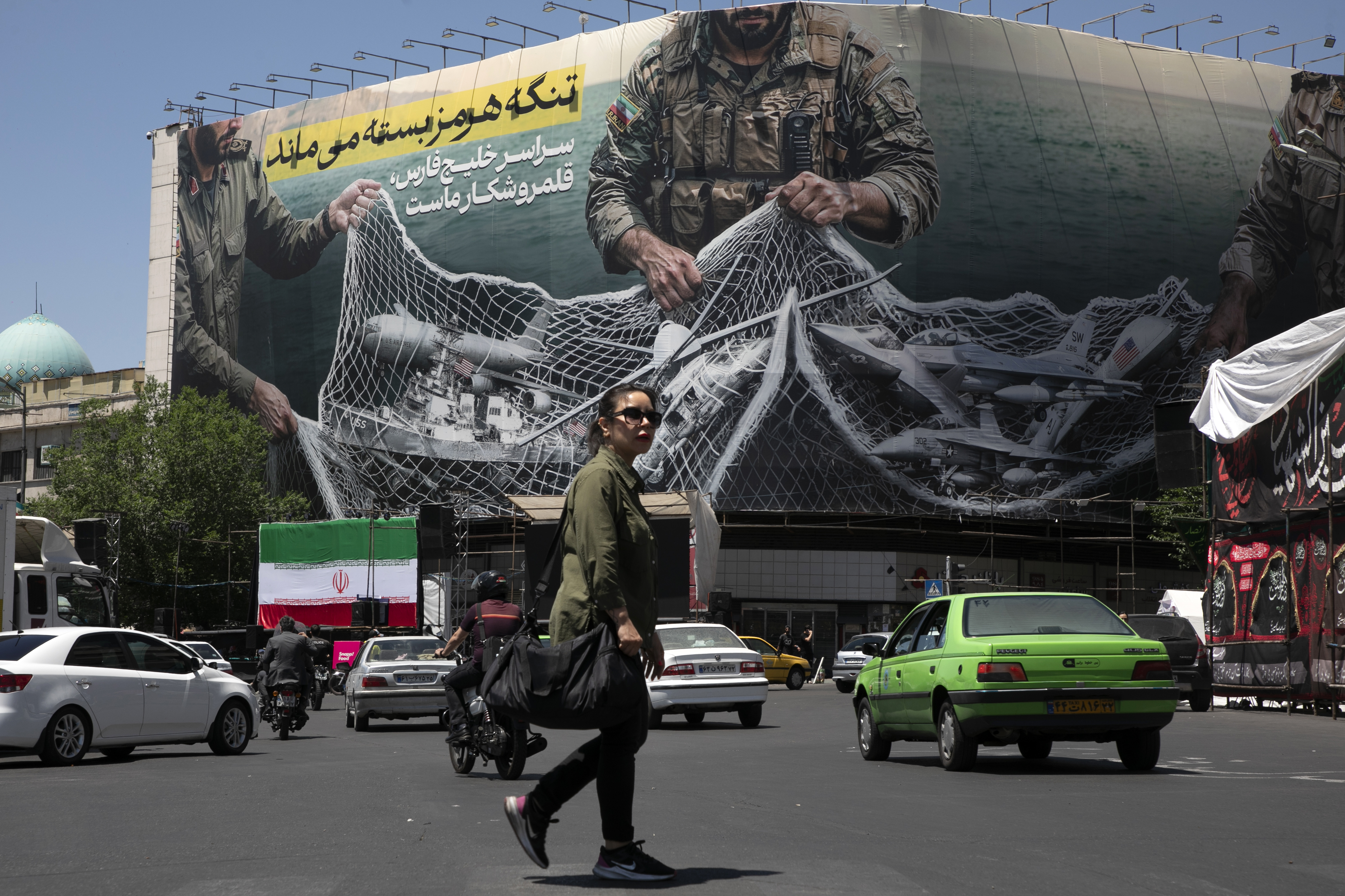 Iran ceasefire tested as cargo ship catches fire and Kuwait reports drone attack