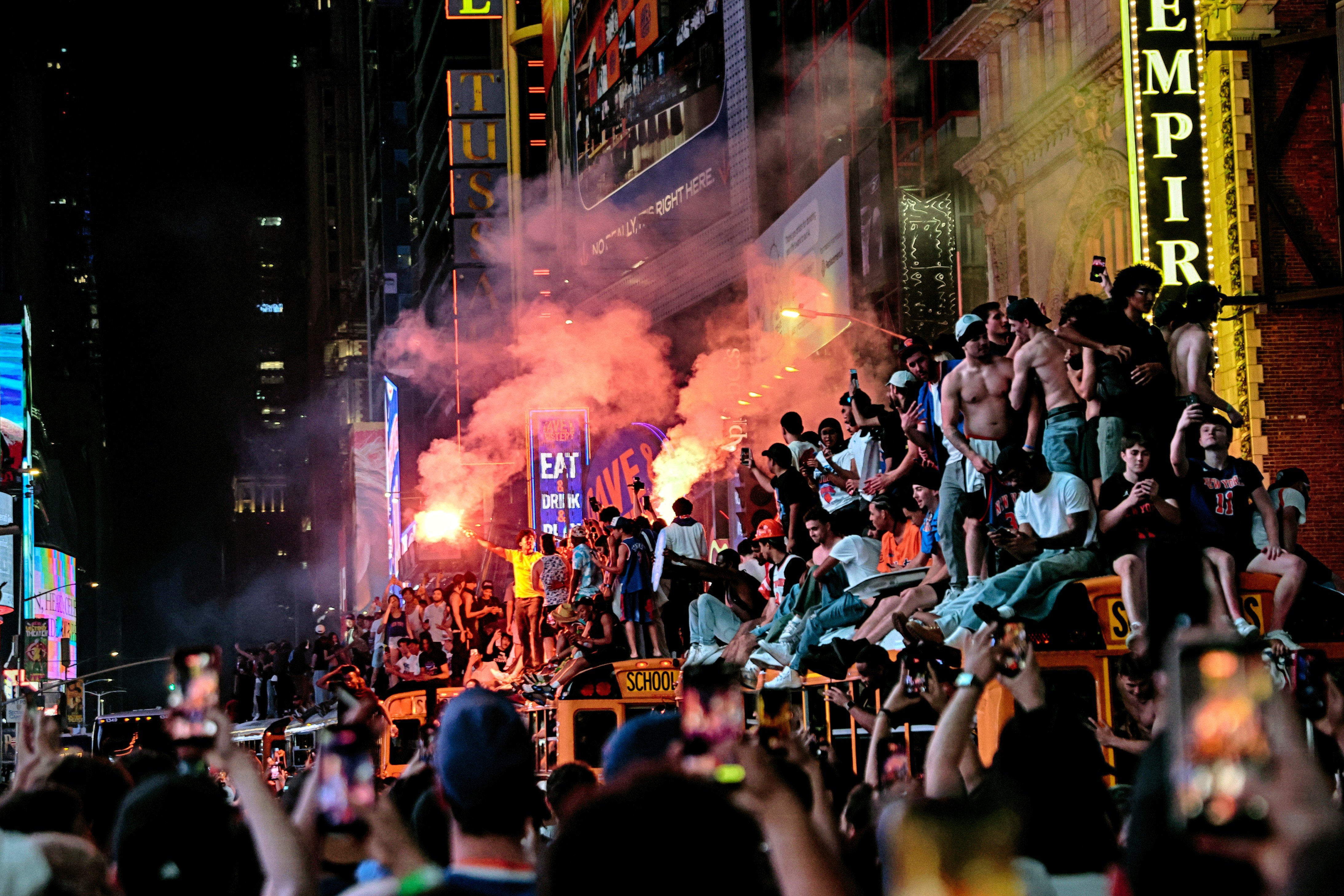 Mayhem mars euphoria as New York City celebrates the Knicks' first championship in 53 years