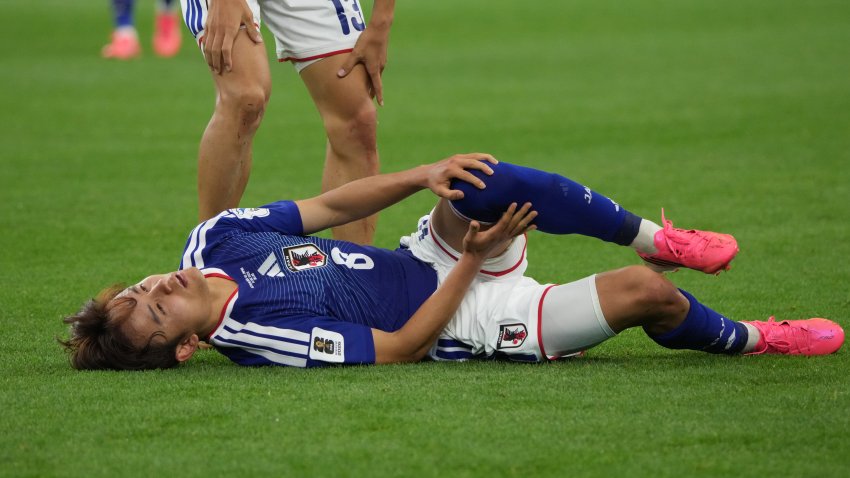 DALLAS, TEXAS – JUNE 14: Takefusa Kubo of Japan lies injured during the FIFA World Cup 2026 Group F match between Netherlands and Japan at Dallas Stadium on June 14, 2026 in Dallas, Texas. (Photo by Etsuo Hara/Getty Images)