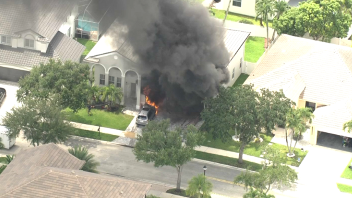Crews respond after large fire breaks out at home in Weston