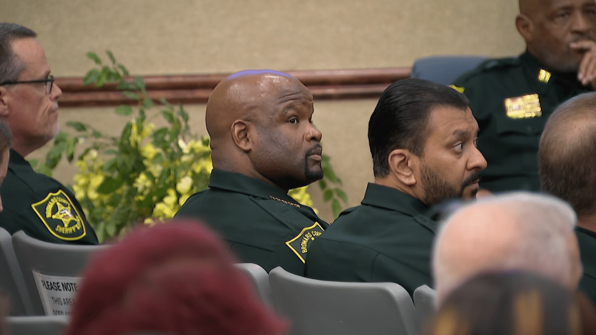 Broward Sheriff Gregory Tony and BSO personnel seated at the Pompano Beach commission meeting