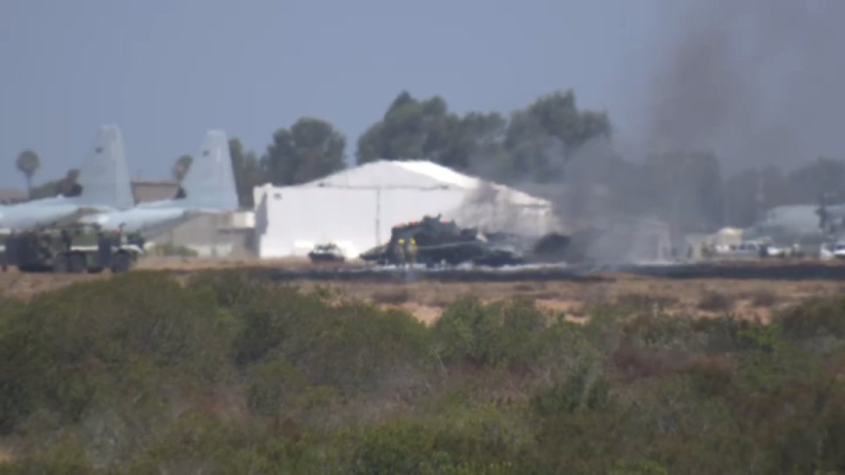 Fighter jet crashes and sparks small fire after 'mishap' at San Diego Marine base