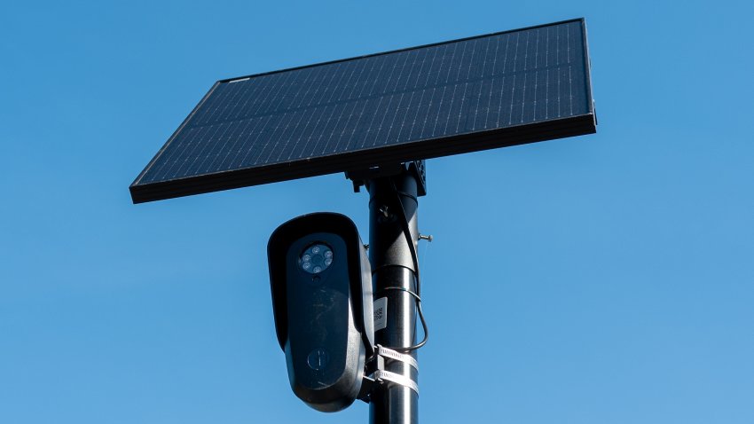 Flock license plate reader and camera with solar panel against a blue sky, Pleasant Hill, California,