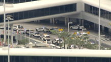 Deputi Miami-Dade menanggapi Bandara Internasional Miami pada 23 September 2026.