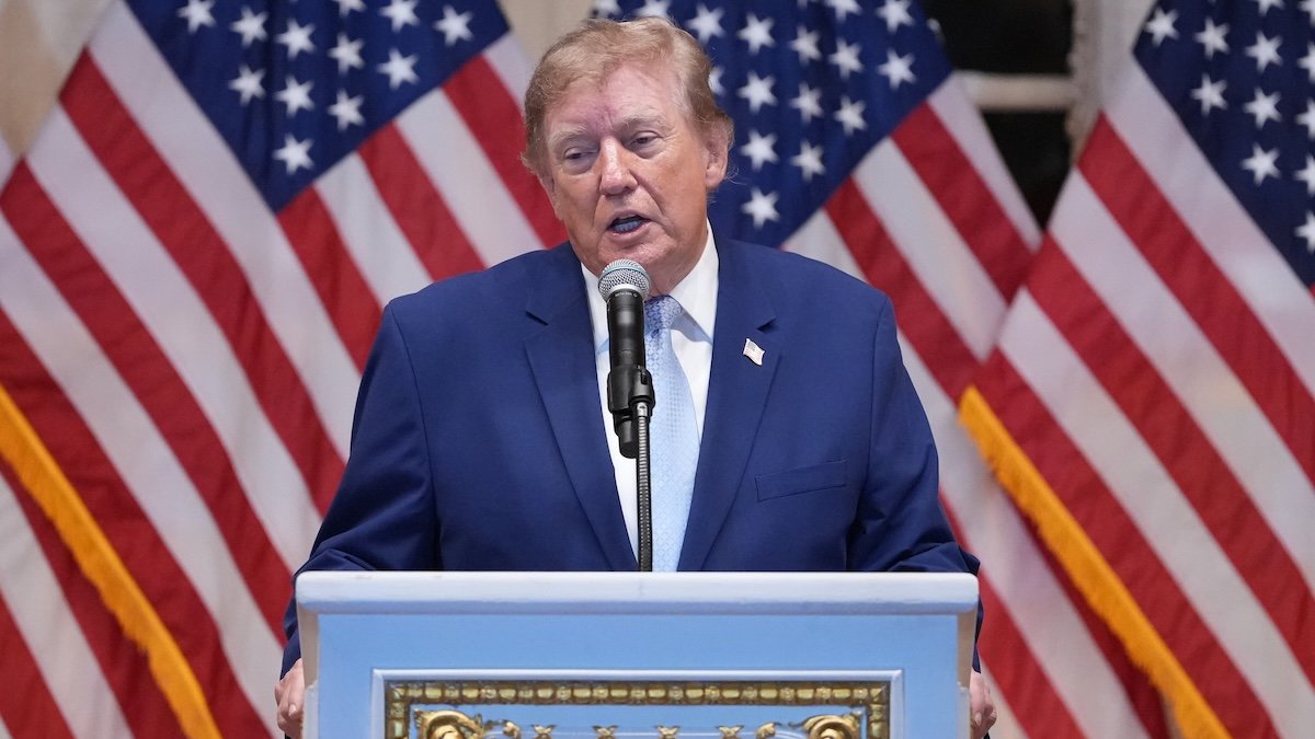 Trump puts new Russia sanctions that he recently signed into law on hold, citing national interest