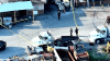 Man dead, another in custody after shooting at Medley machinery shop, police say