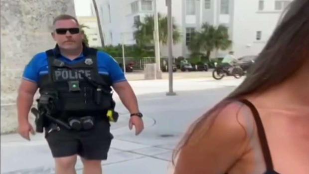 Group Topless Beach Models - Miami Beach Cop Relieved of Duty After RisquÃ© Video Shows ...