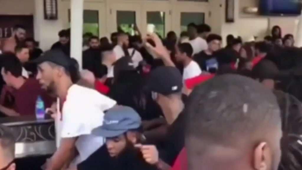 Out-of-Control Crowd Over Shoe Launch